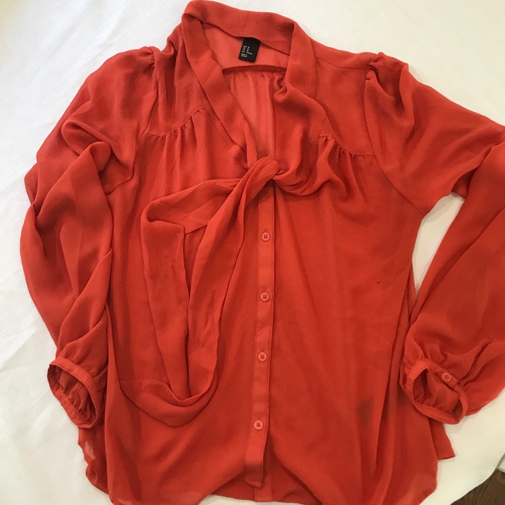 Orange sheer work top